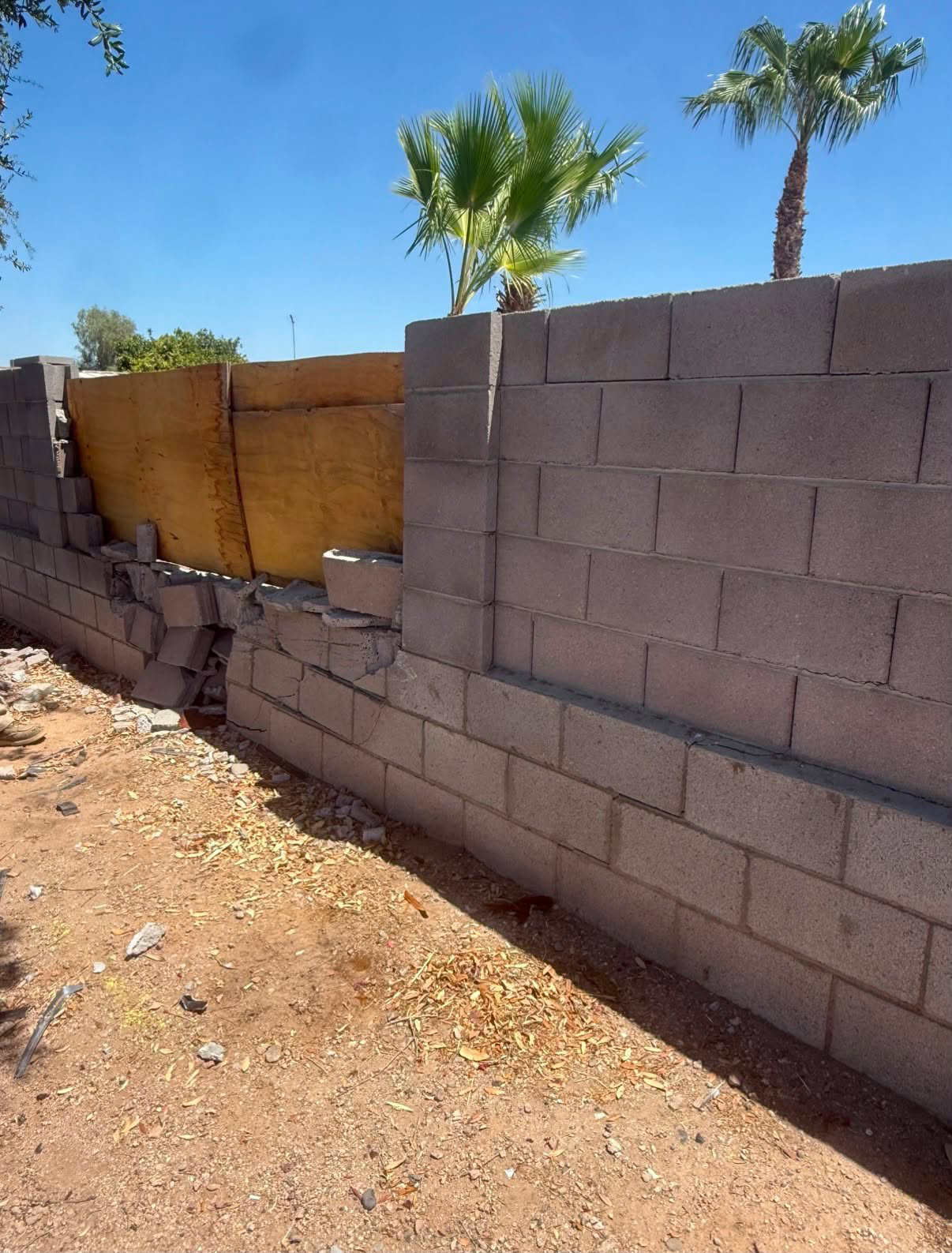 Collapsed Property-Line Wall Rebuild — before