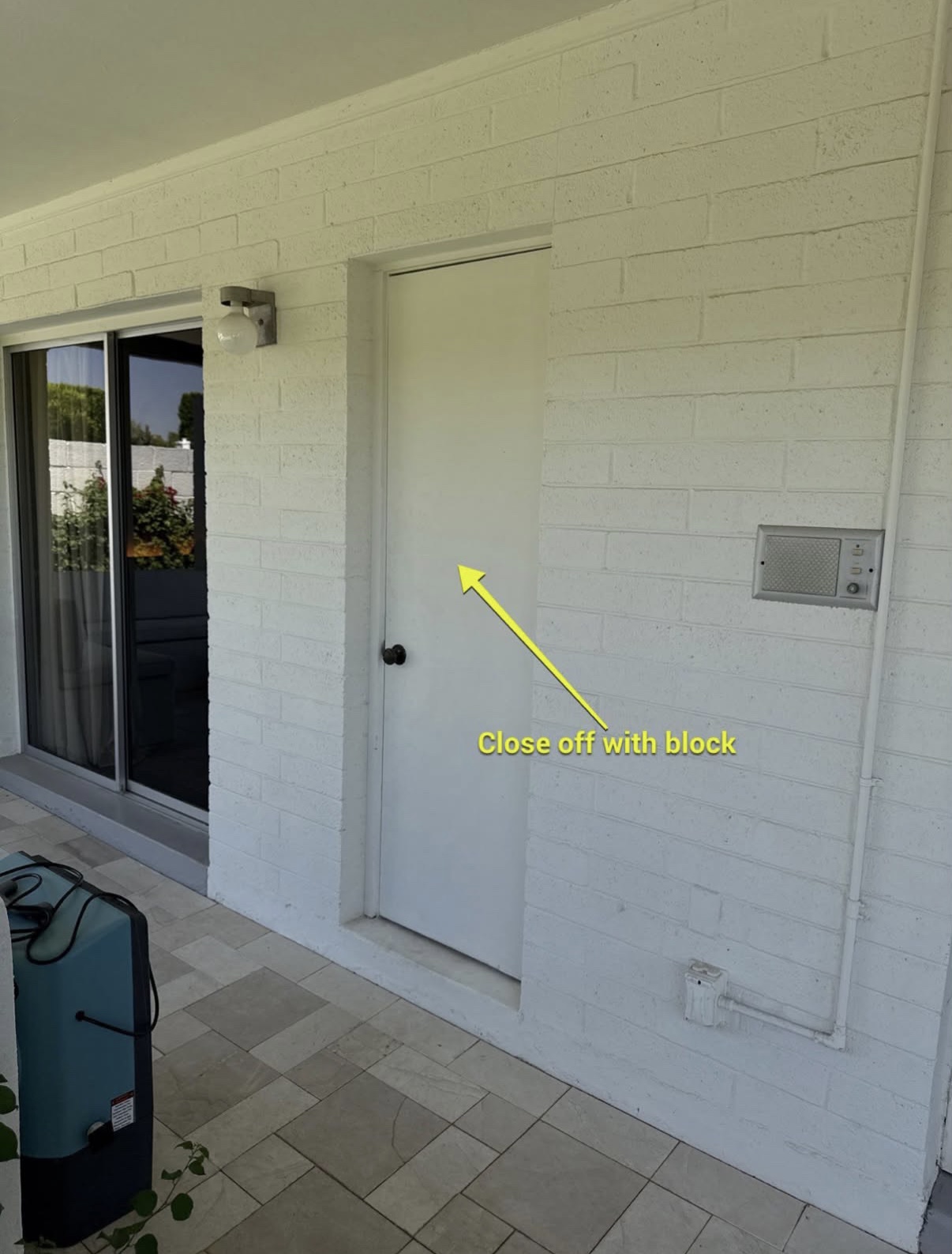 Doorway Closed Off With Block — before