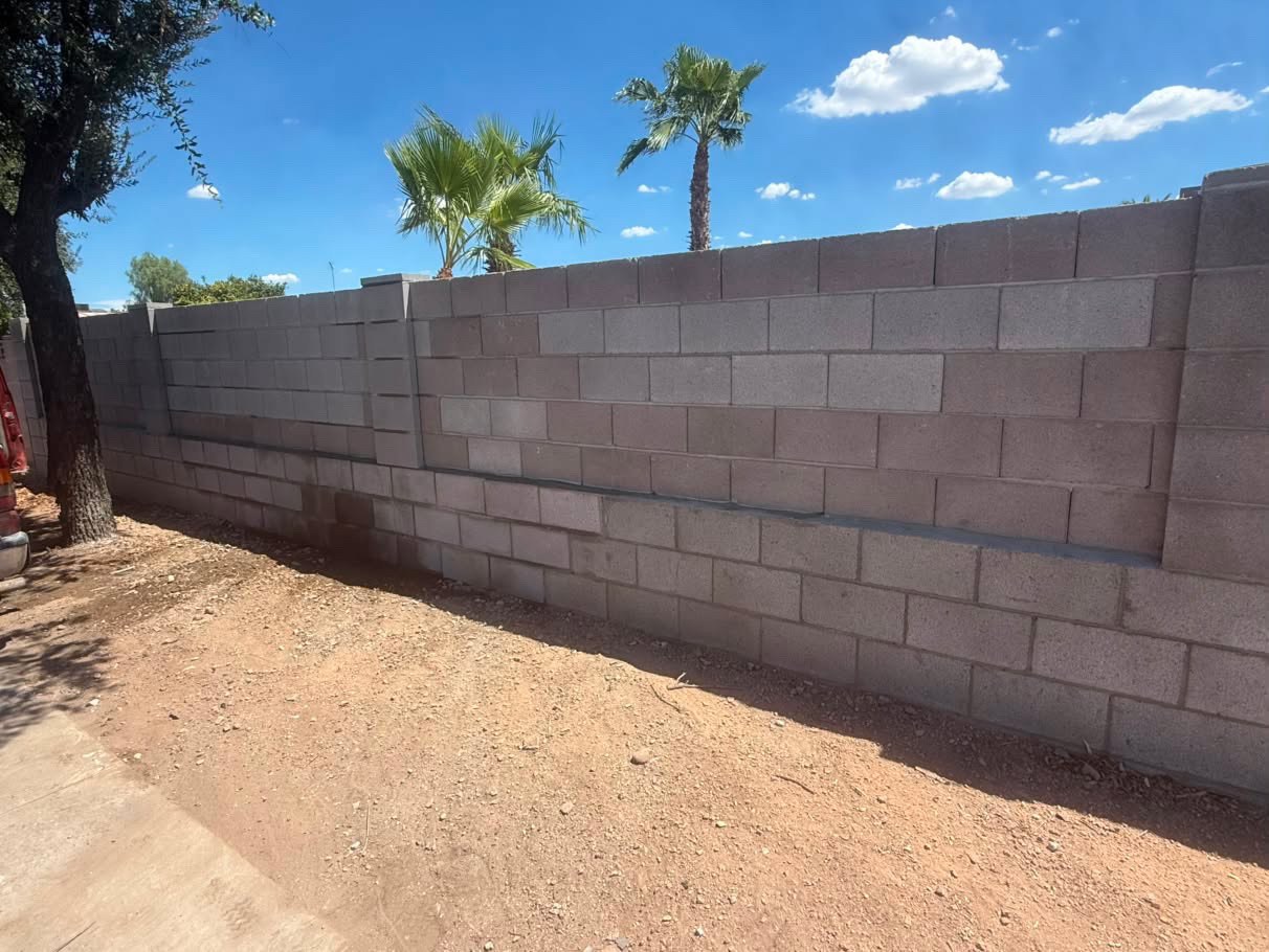 Collapsed Property-Line Wall Rebuild — after